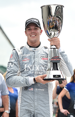 Oliver Askew with Freedom 100 trophy